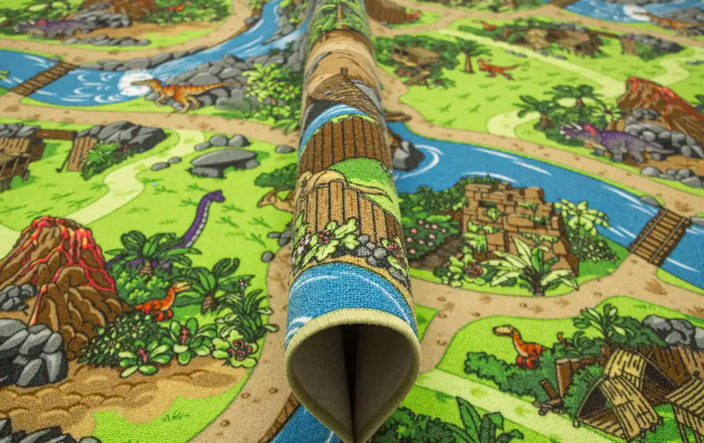 Dětský metrážový koberec Dino vesnice dinosaurů Vrácení Zdarma